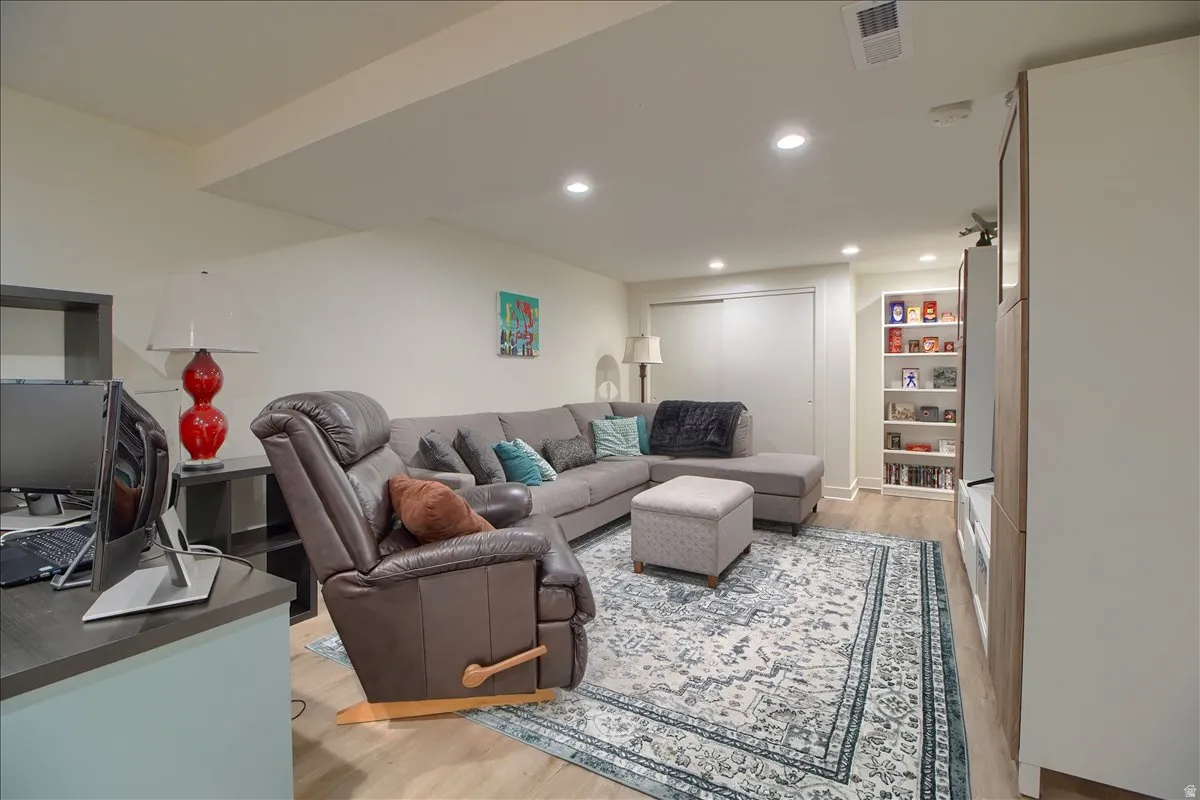 Family room featuring built-ins, recessed lighting, and Plenty of storage