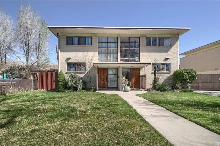 View of front of property with brick siding