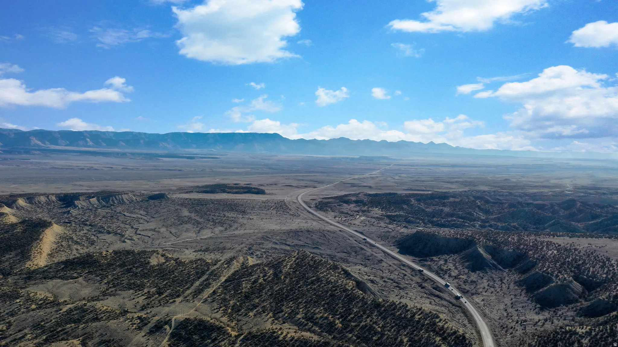 Bird's eye view of a mountainous background