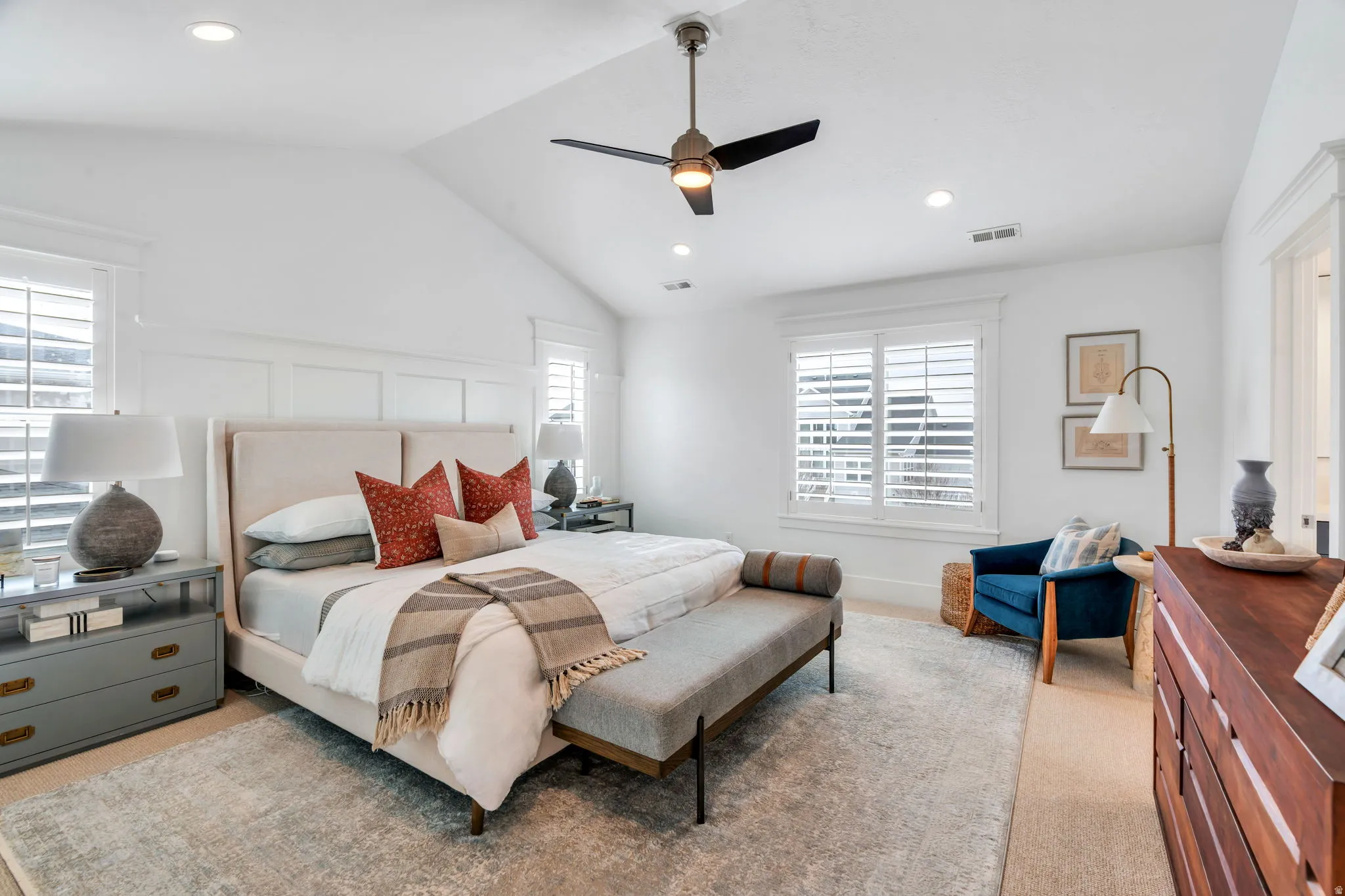 Bedroom with light colored carpet, multiple windows, lofted ceiling, recessed lighting, and ceiling fan