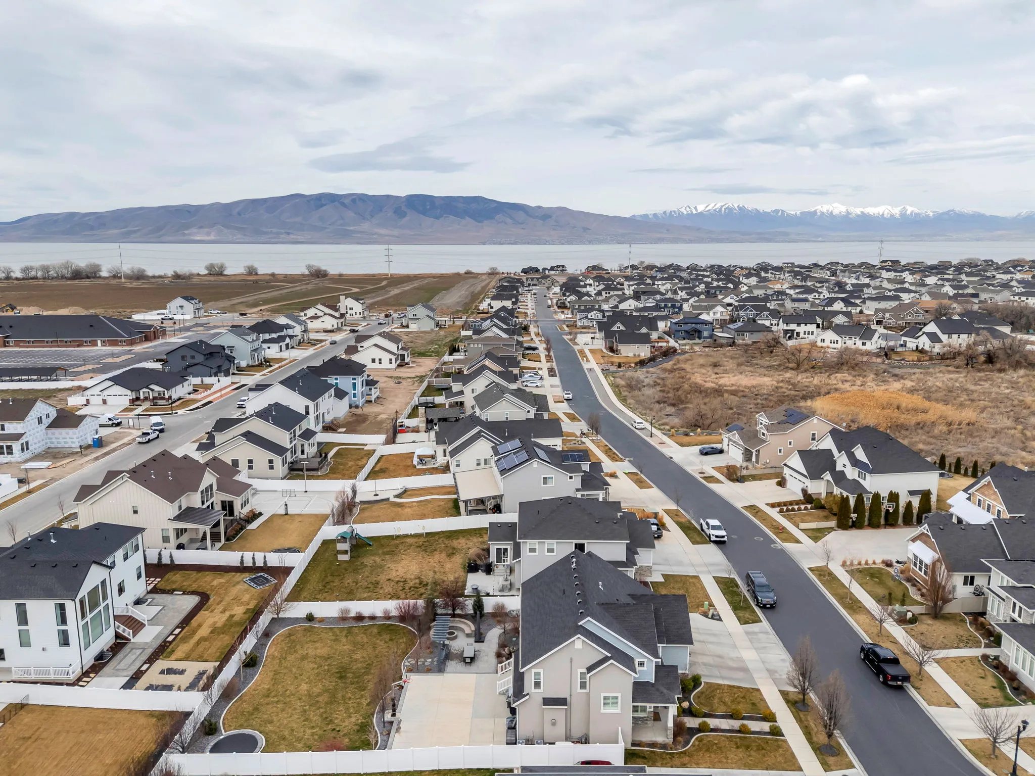 Aerial view of residential area with a mountain backdrop