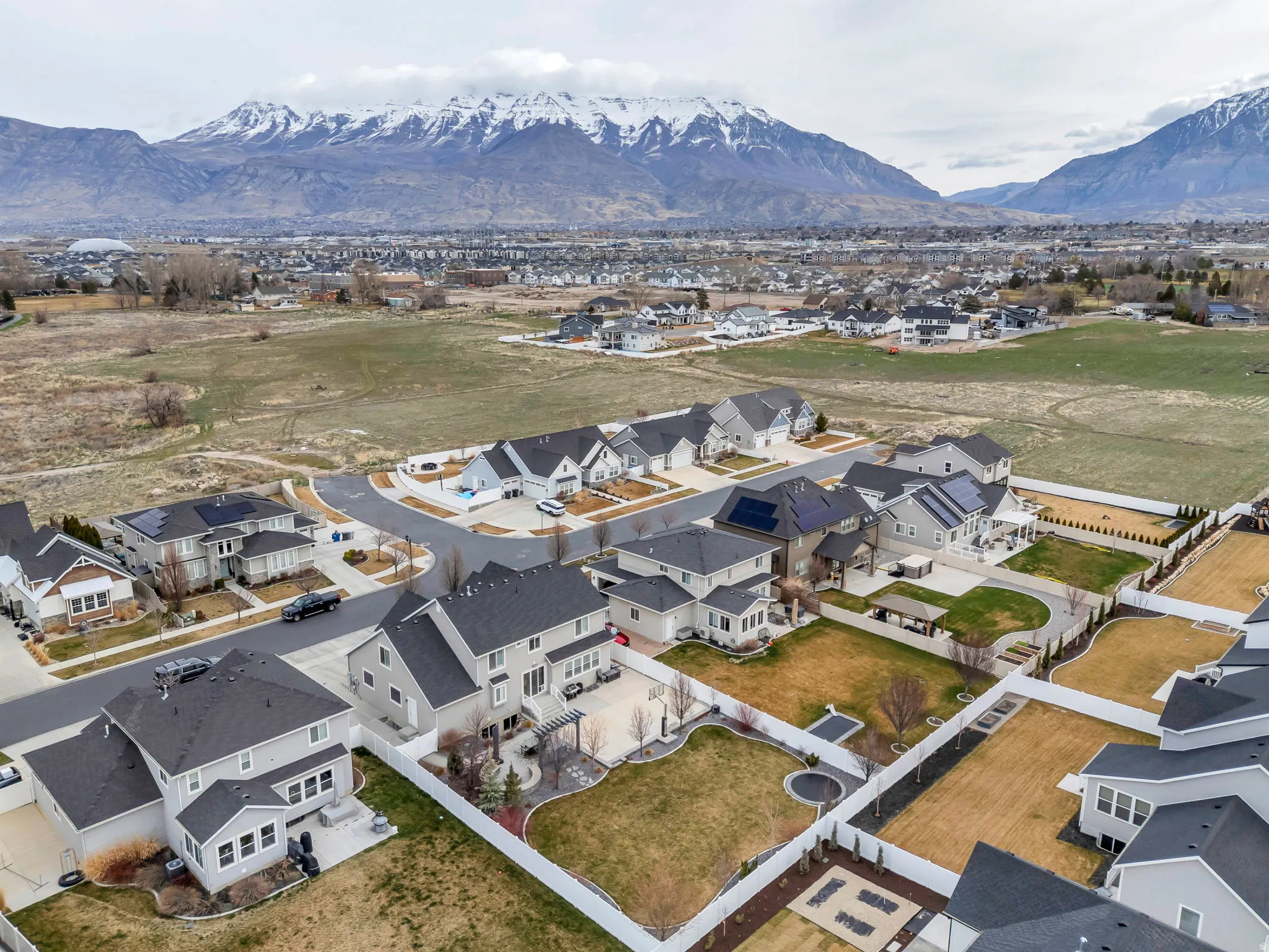 Aerial view of residential area with a mountain backdrop