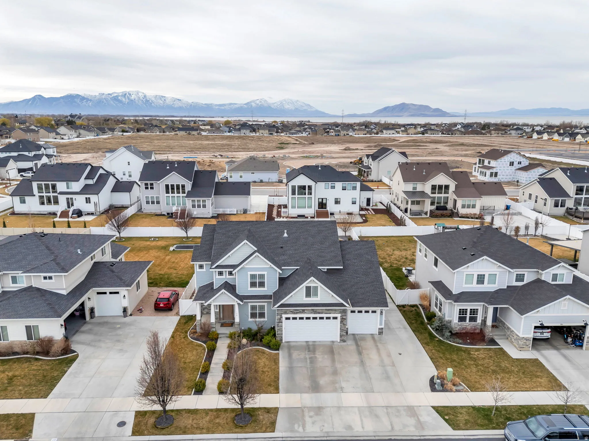 Aerial perspective of suburban area with mountains
