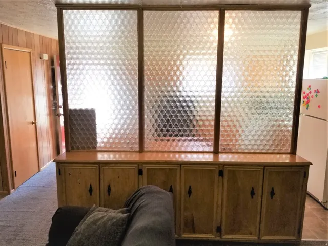 Custom room divider, upstairs unit