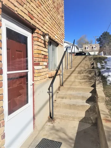 Entrance to basement unit, south side