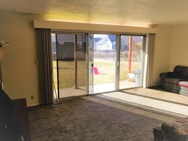 Large sliding door, patio space, basement unit