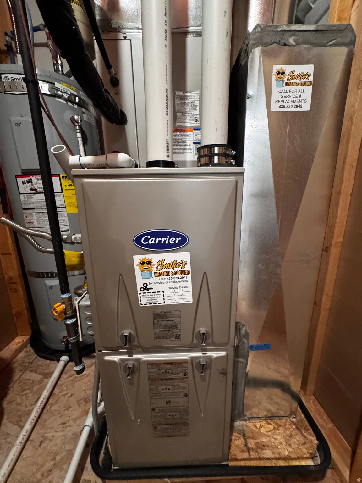 Utility room with secured water heater and heating unit