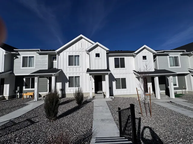 Modern farmhouse style home featuring board and batten siding and covered porch