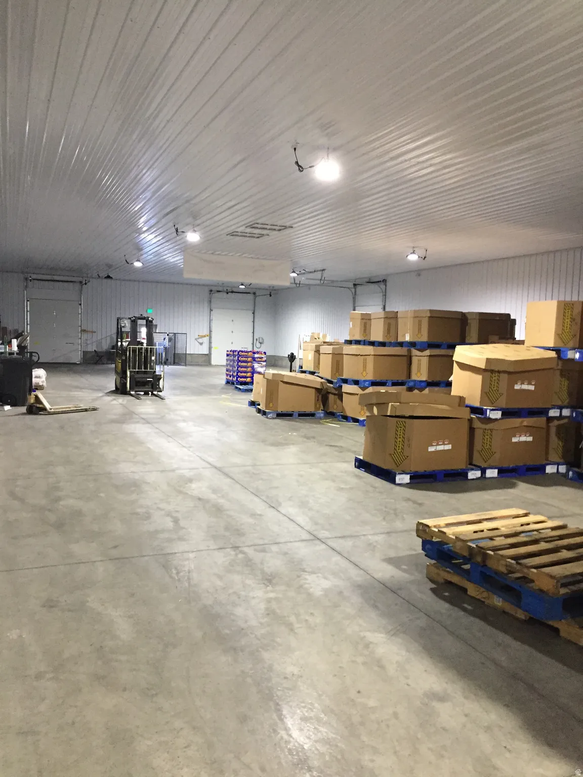 Miscellaneous room with a garage and metal wall