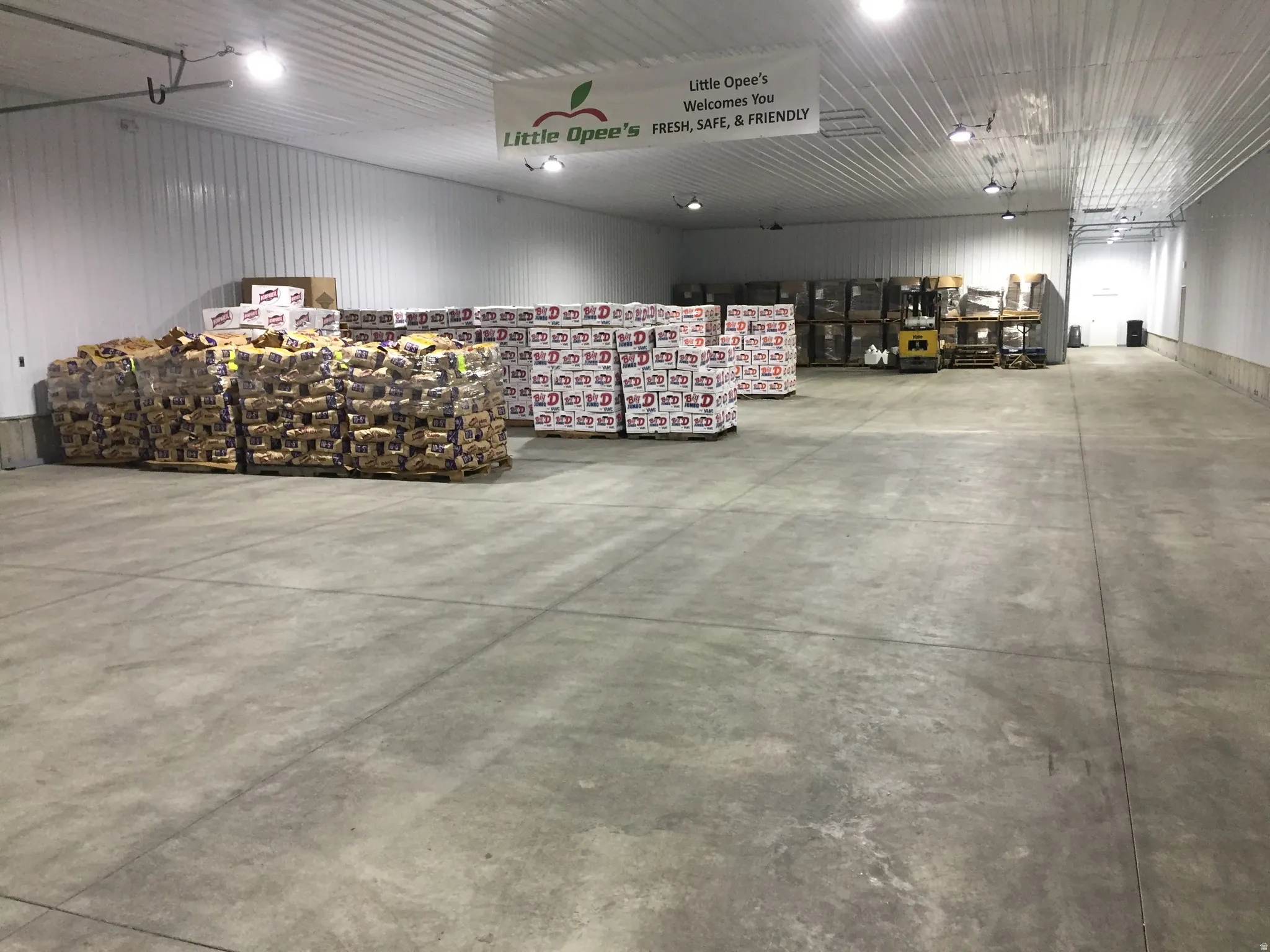 Garage featuring metal wall