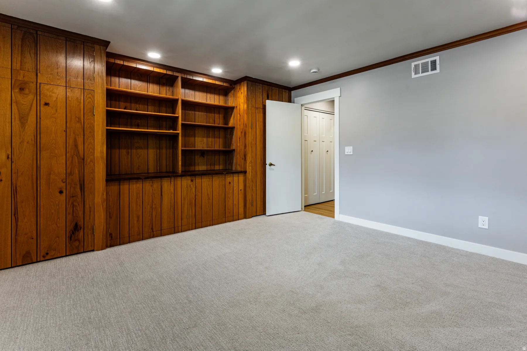 Unfurnished bedroom with carpet flooring, recessed lighting, and ornamental molding