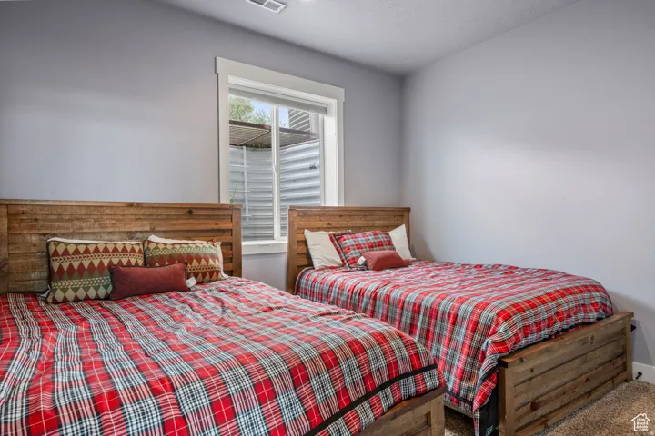 Bedroom featuring a textured ceiling