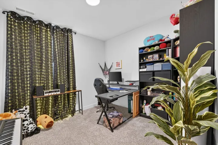 Office featuring carpet floors and baseboards