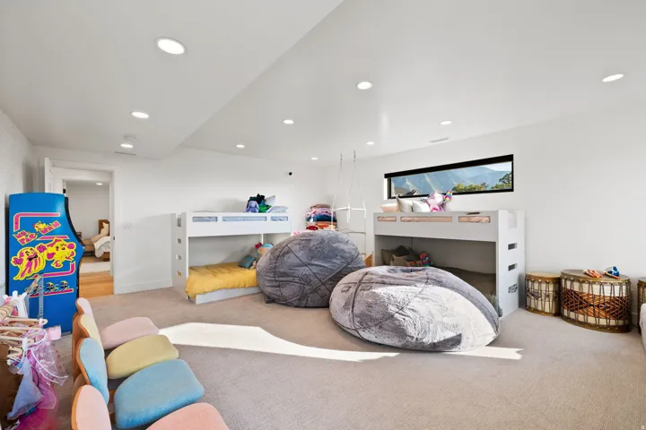 Bedroom featuring light colored carpet and recessed lighting