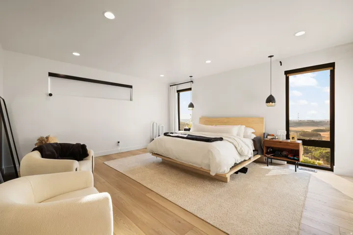 Bedroom featuring light wood-style flooring and recessed lighting