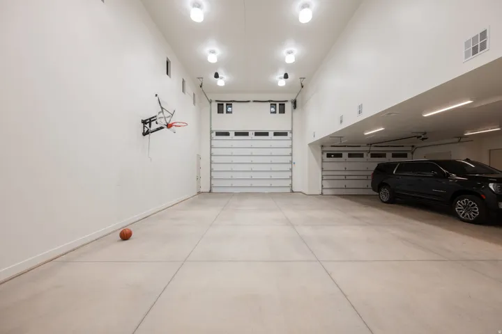 Garage featuring baseboards