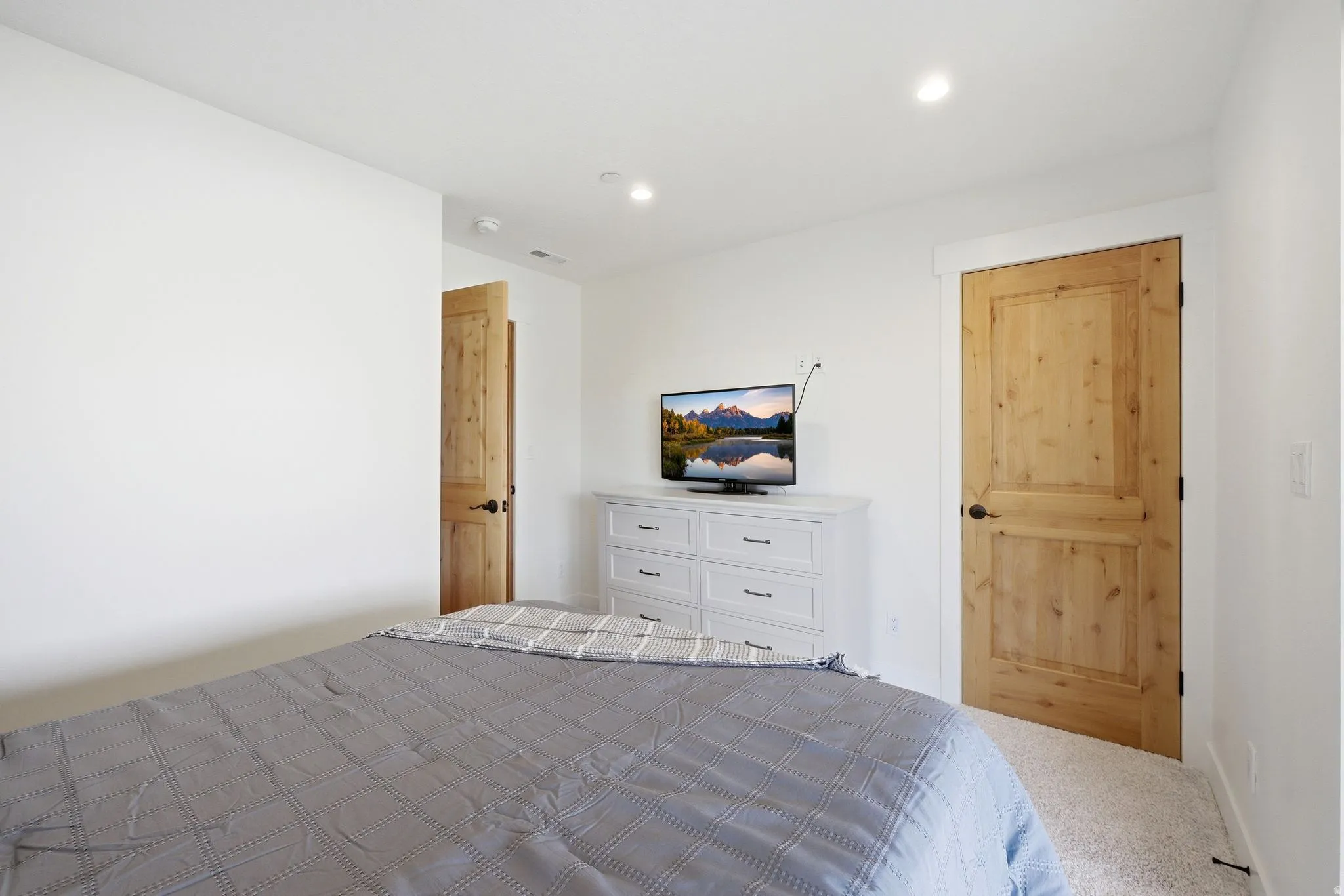 Bedroom featuring carpet and recessed lighting