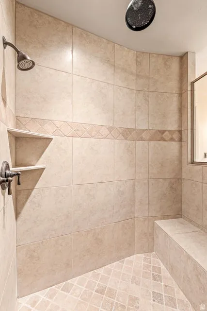 Full bathroom featuring a stall shower