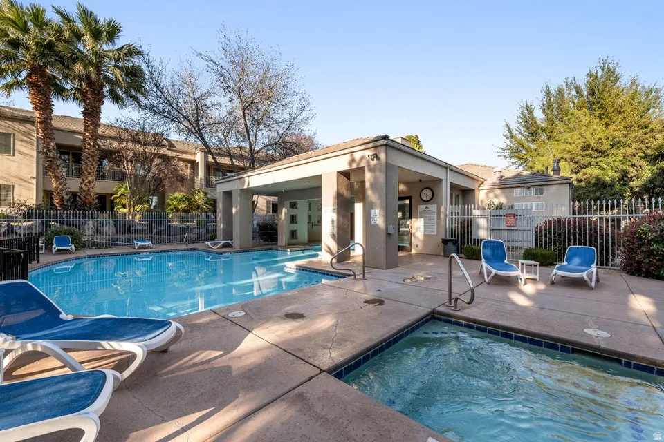 Community pool with a patio area