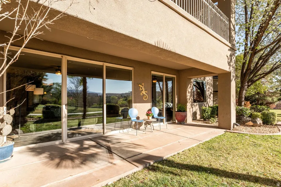 Patio / terrace with a patio and a lawn