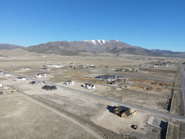 View of mountain background with nearby suburban area and rural landscape