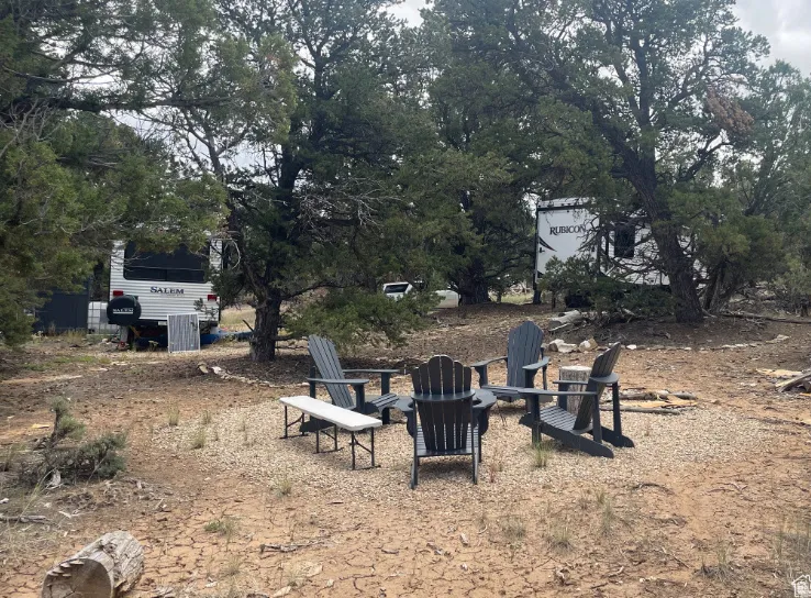 View of yard featuring a fire pit