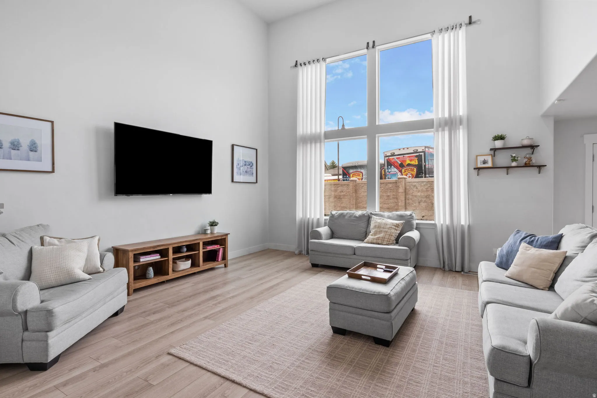 Enjoy the sunshine through the 2 story windows.
