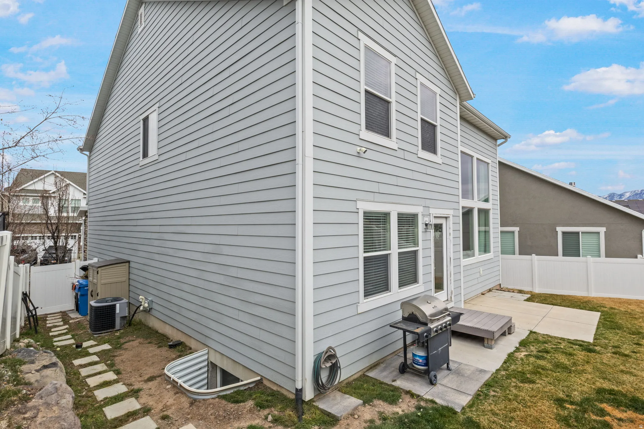 Rear view of house with a patio