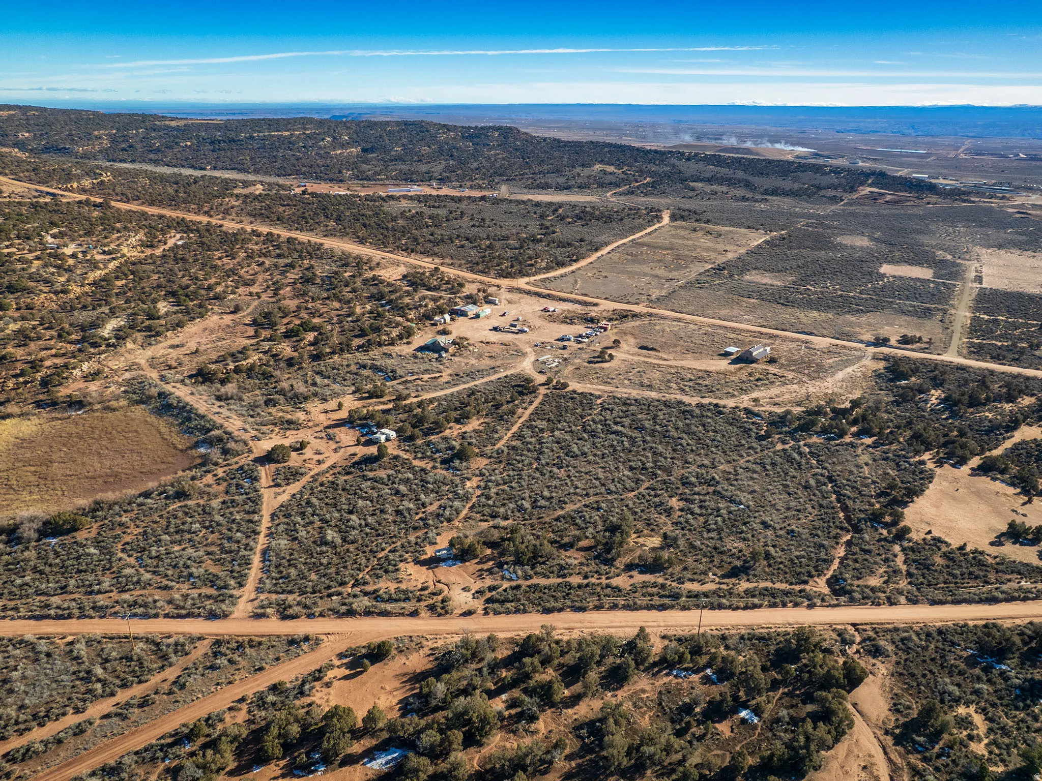 Aerial view of sparsely populated area featuring a desert landscape