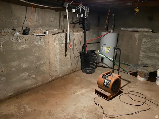 Unfinished basement with electric water heater