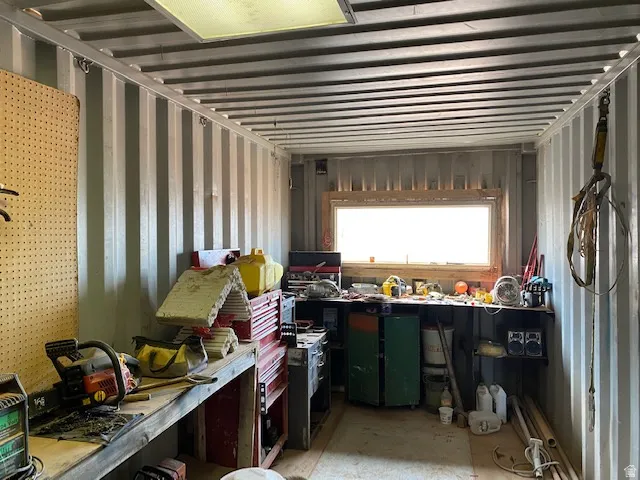 Misc room with a workshop area
