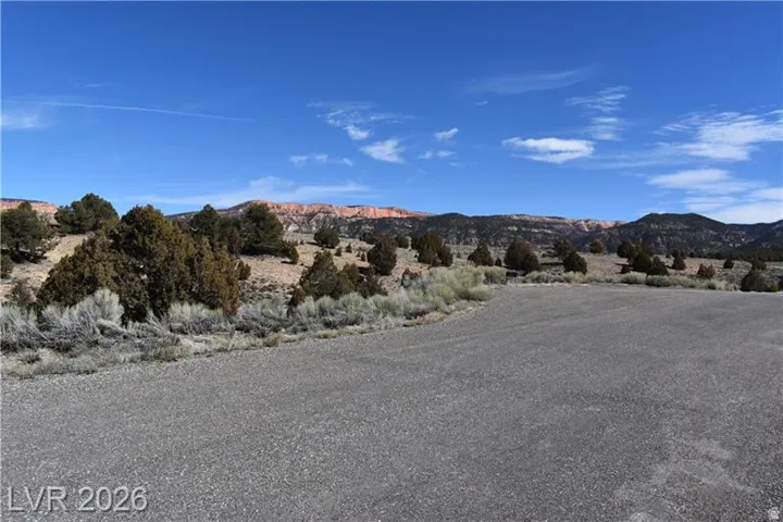 View of asphalt road featuring a mountain view