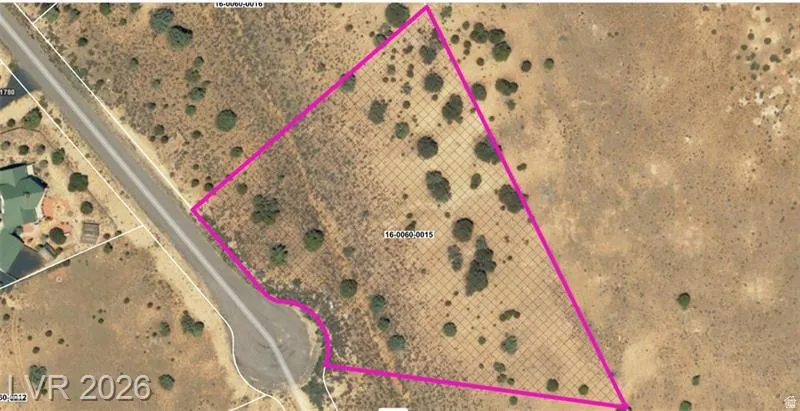 Aerial view of property's location featuring property parcel outlined