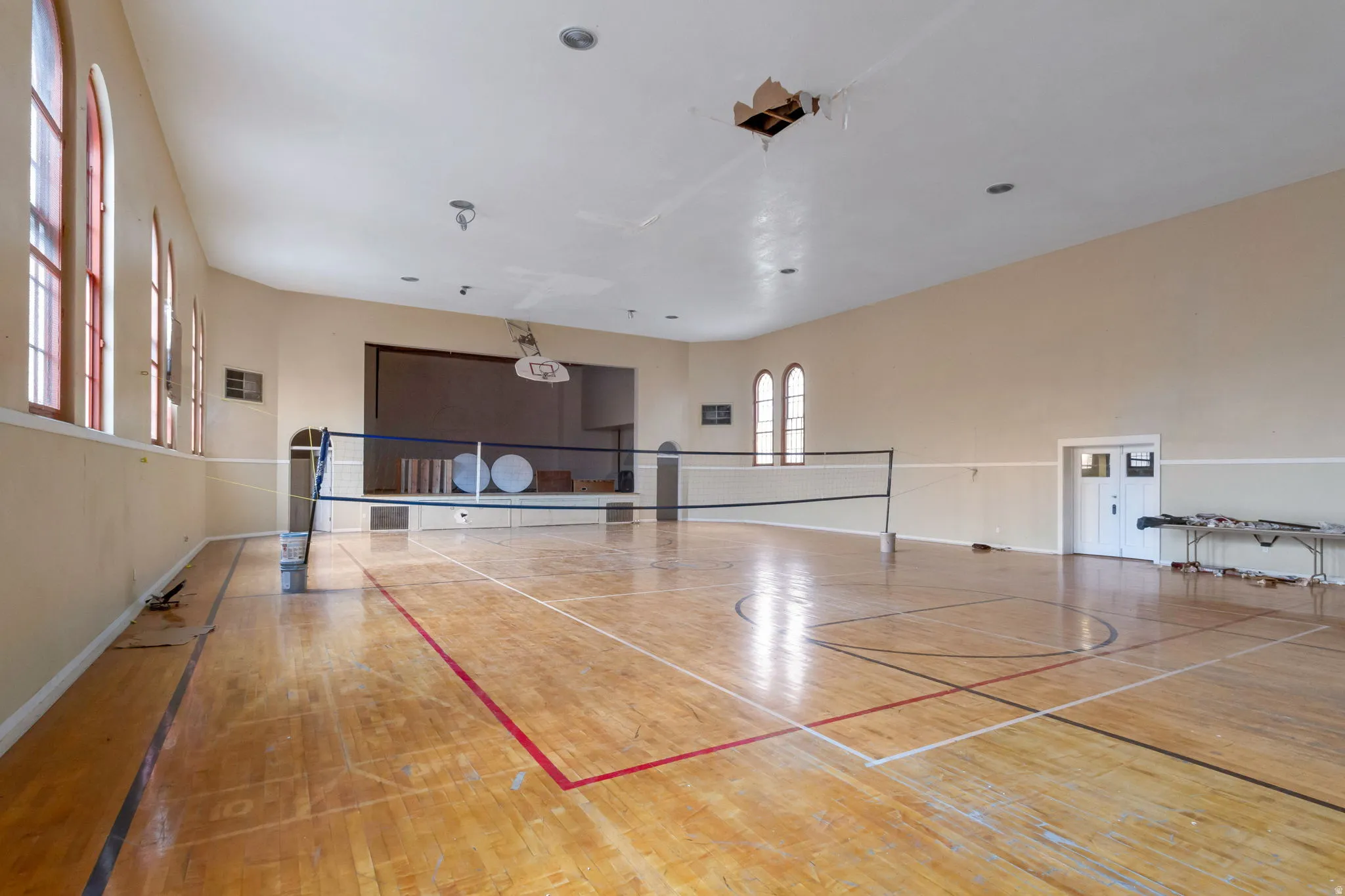 View of basketball court featuring community basketball court and a patio