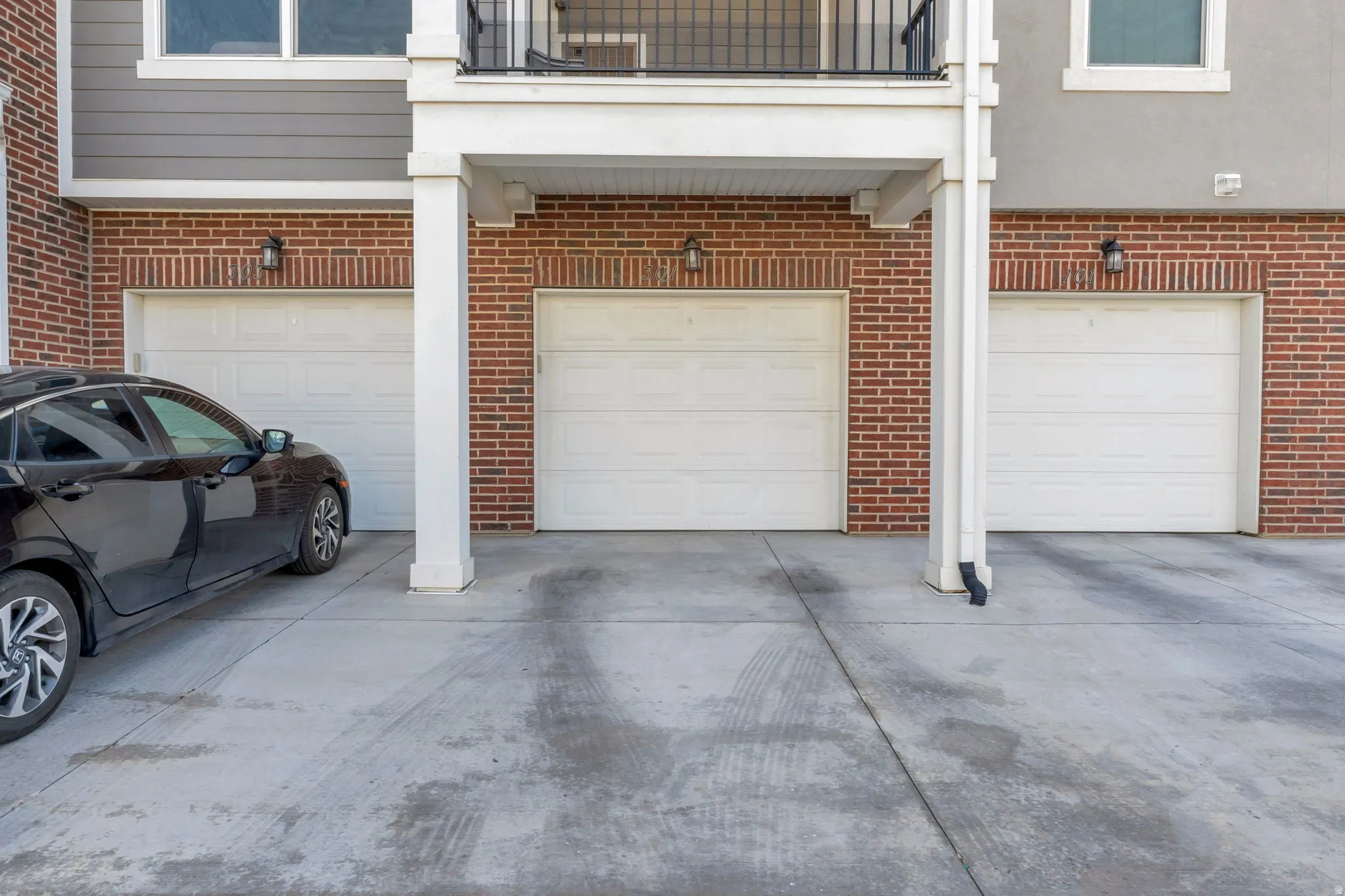 Garage featuring driveway