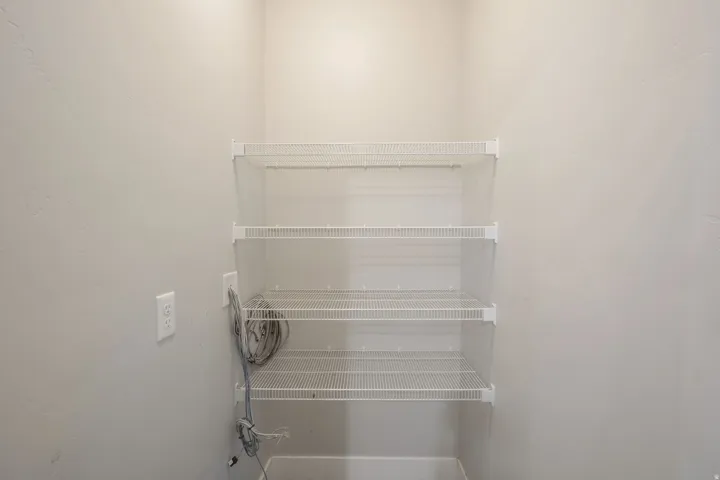 Built-in wire shelving system featuring multiple tiers