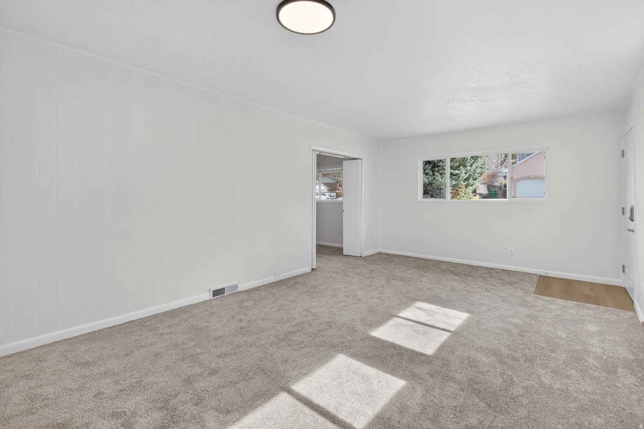 Flex-space featuring plenty of natural light, neutral carpeting and a private entry. Possible ADU conversion, rental income, or a guest wing (buyer to verify city requirements).
