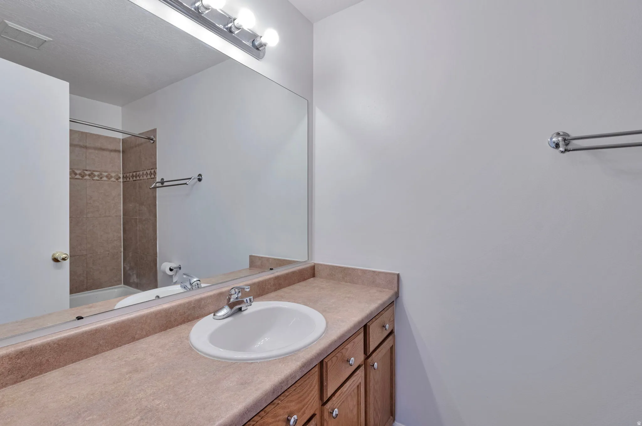 Full bathroom with vanity