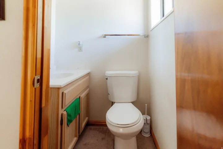 Bathroom with vanity and toilet