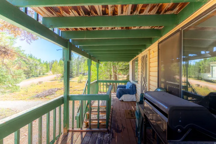 Deck featuring area for grilling