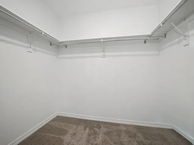 Master bedroom walk in closet.