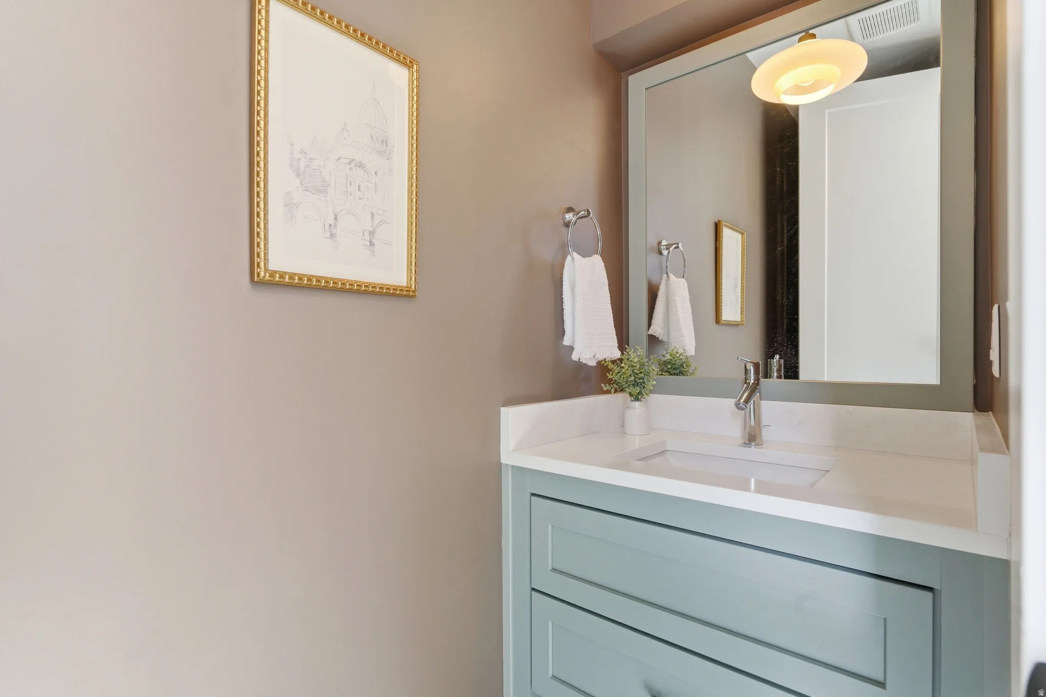 Bathroom featuring vanity