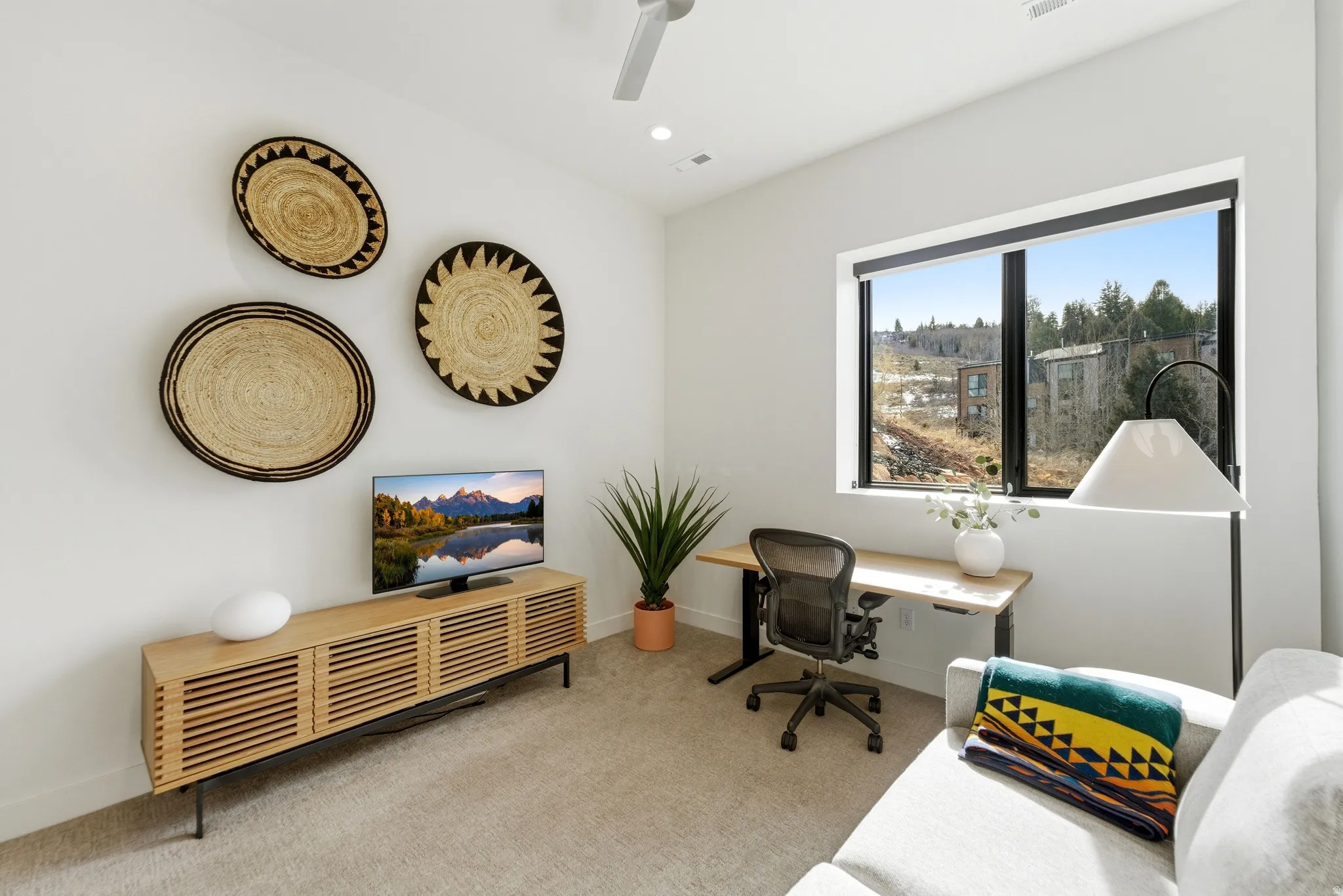 Office area with light colored carpet, recessed lighting, and ceiling fan