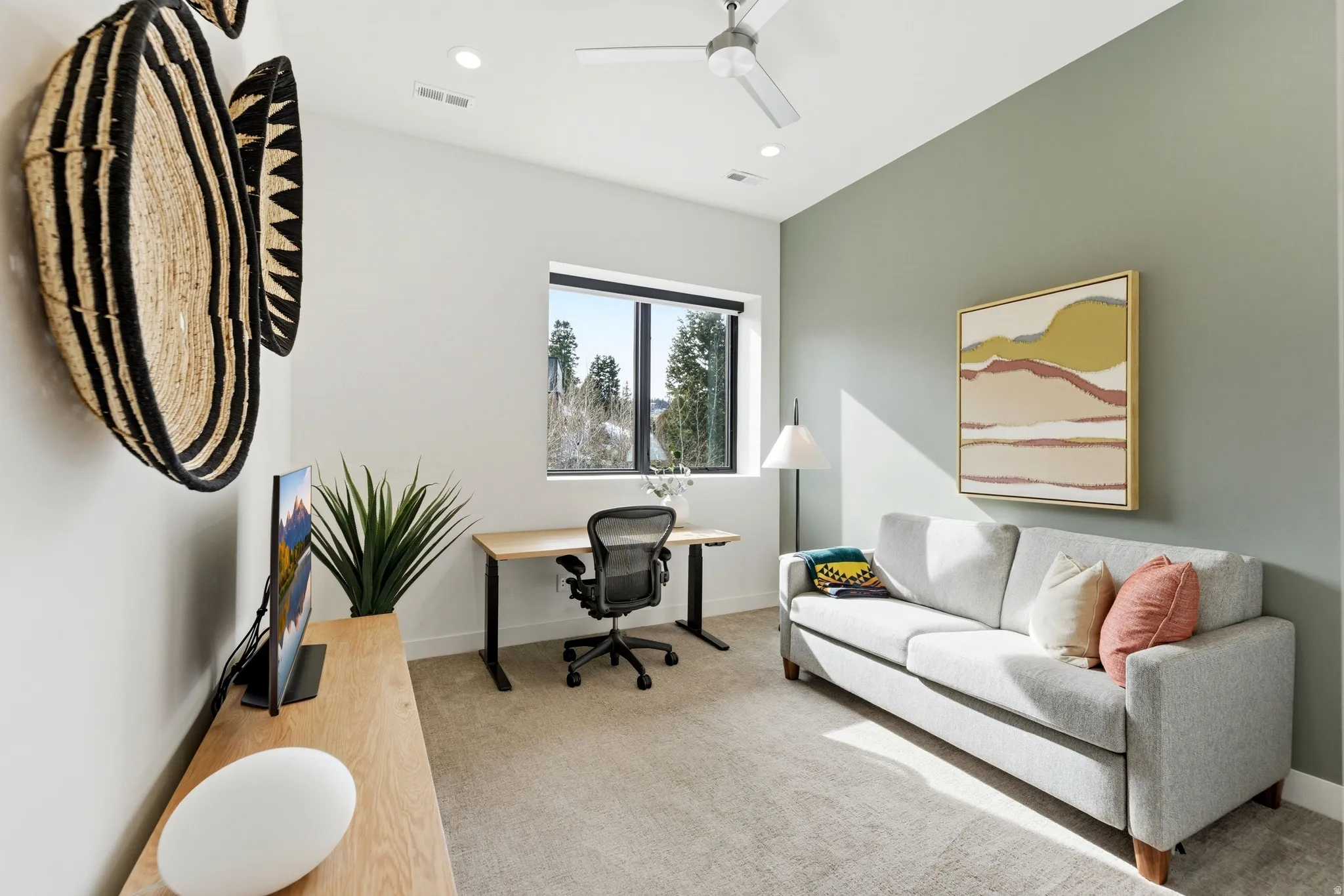 Office featuring light carpet, a ceiling fan, and recessed lighting