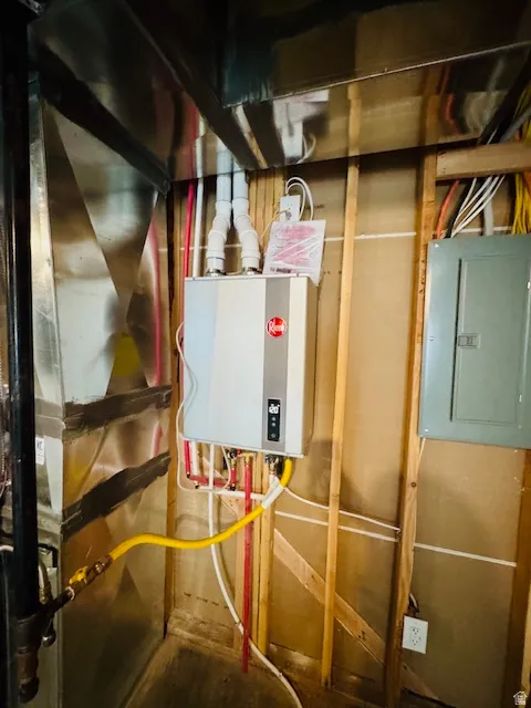 Utilities with electric panel and water heater