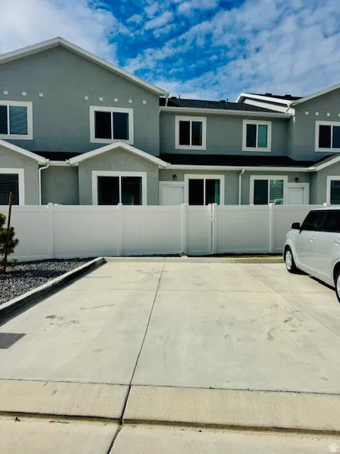 View of front of property with stucco siding