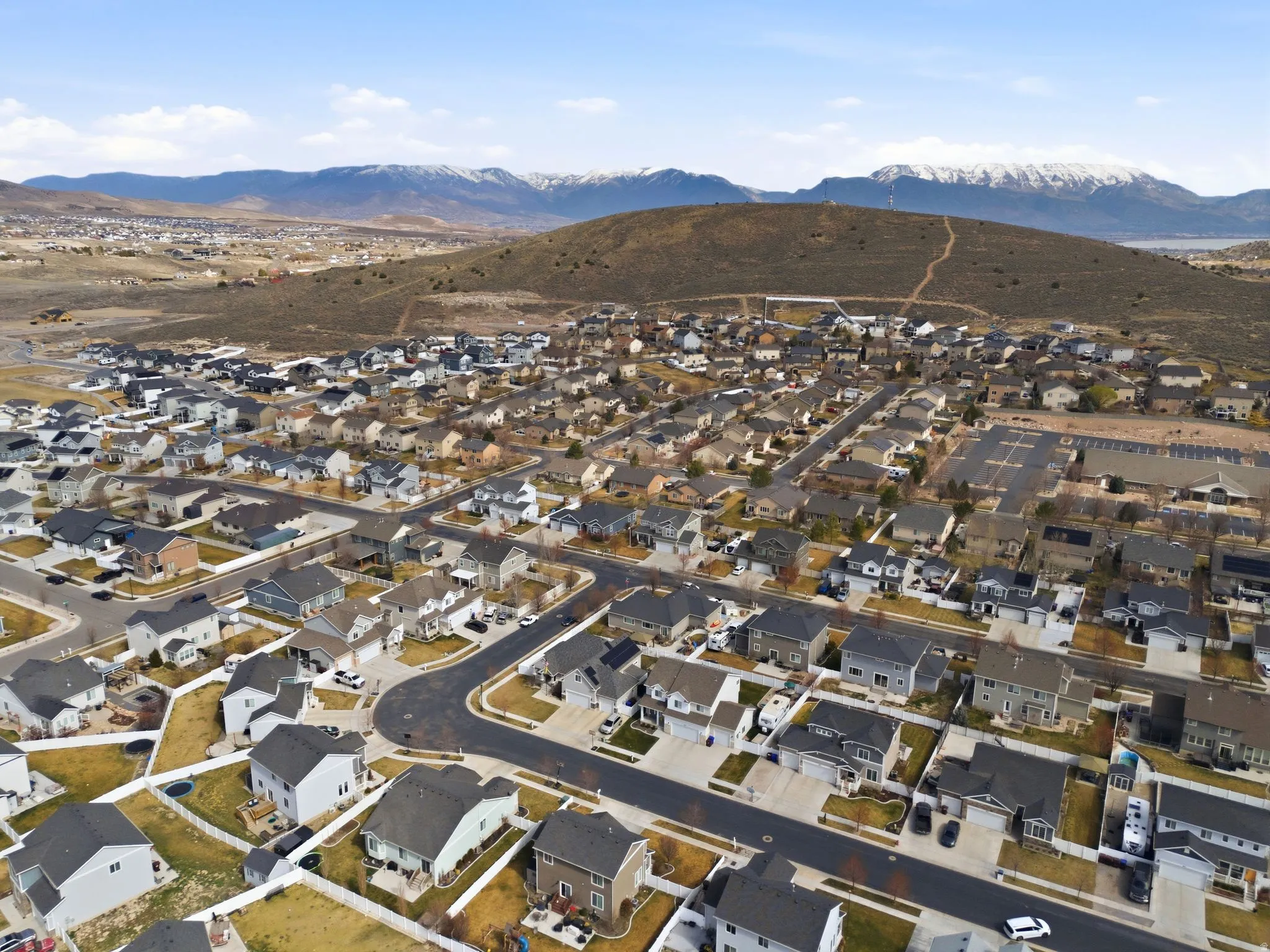 Aerial view of residential area with mountains