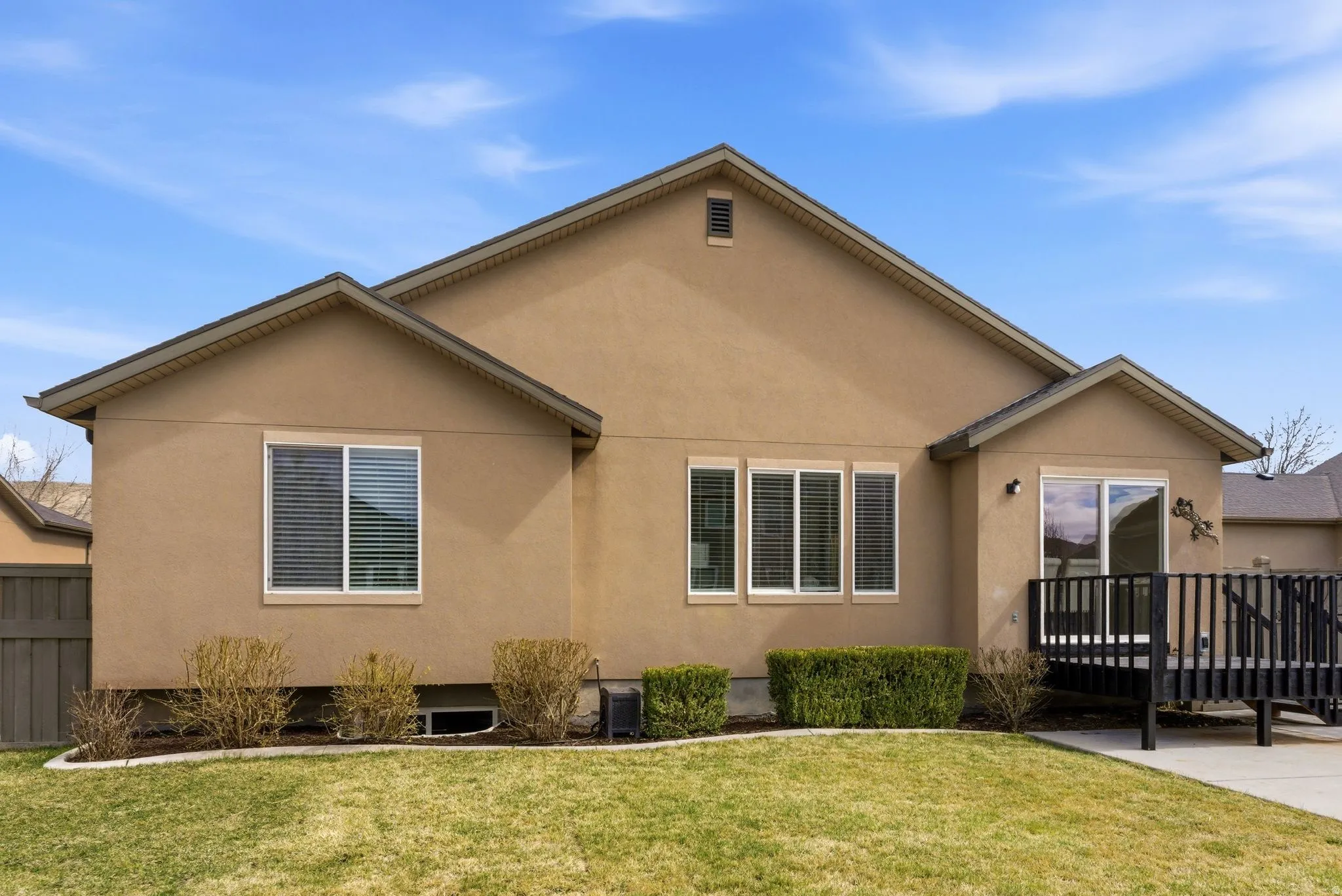 View of front of home featuring stucco siding