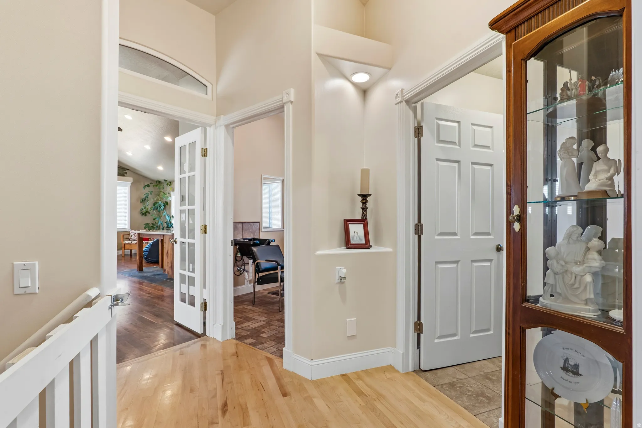 Foyer with light wood-type flooring, french doors, and recessed lighting