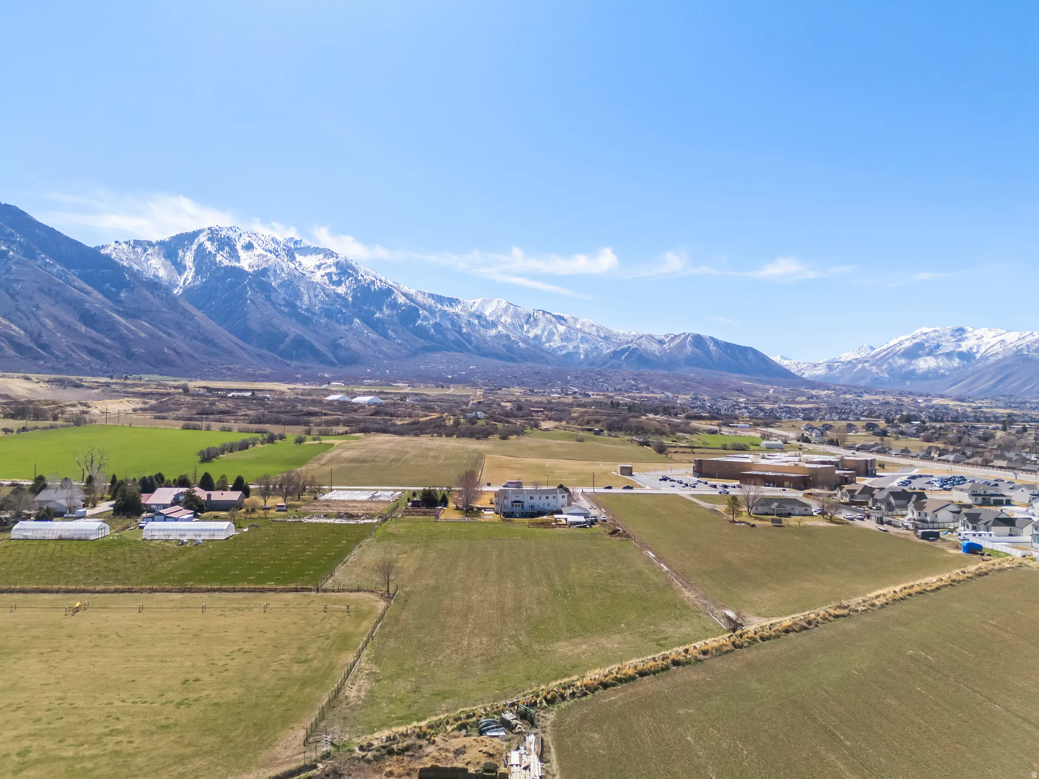 View of mountain backdrop featuring rural landscape